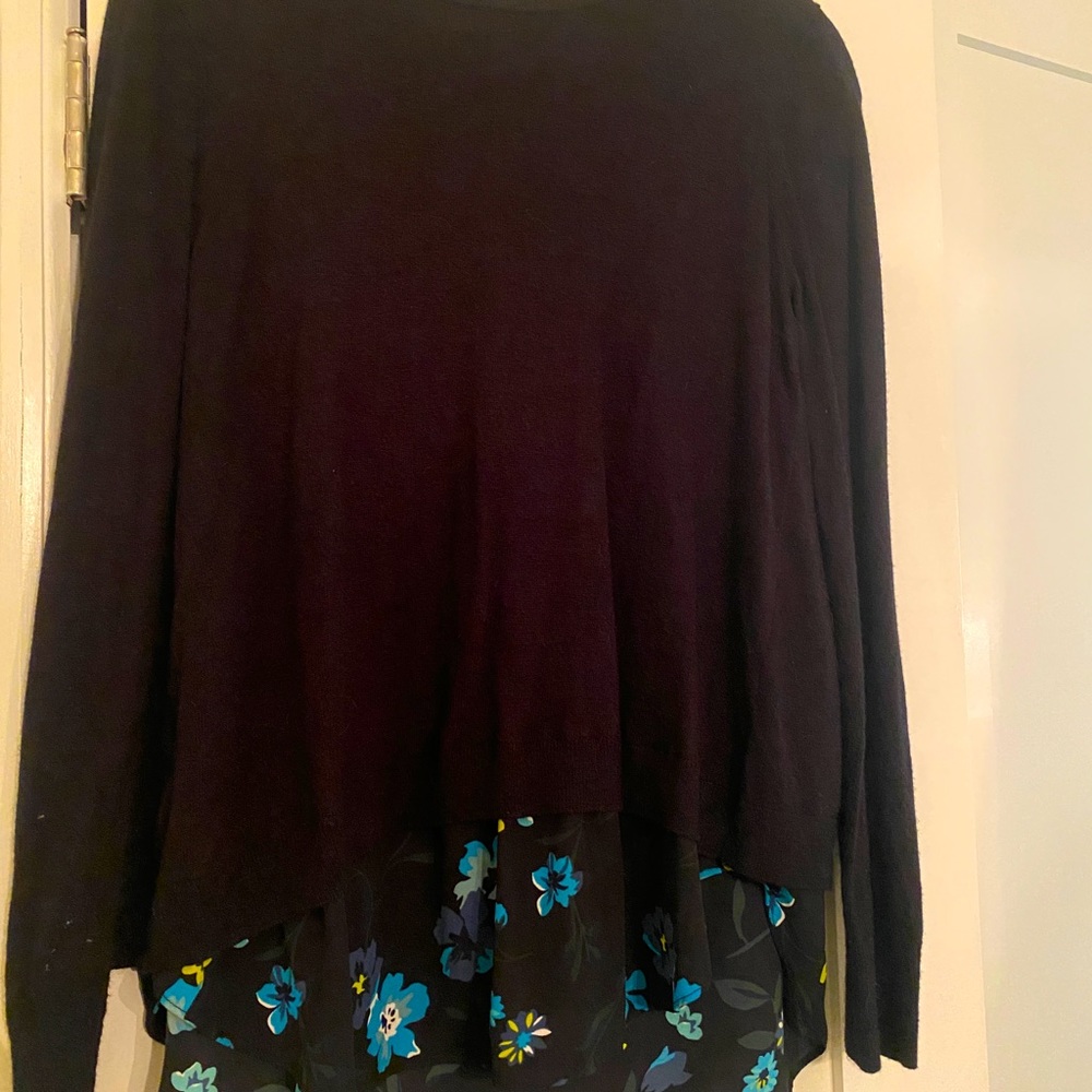 Ann Taylor LOFT black knit split back with floral peekaboo fabric hem